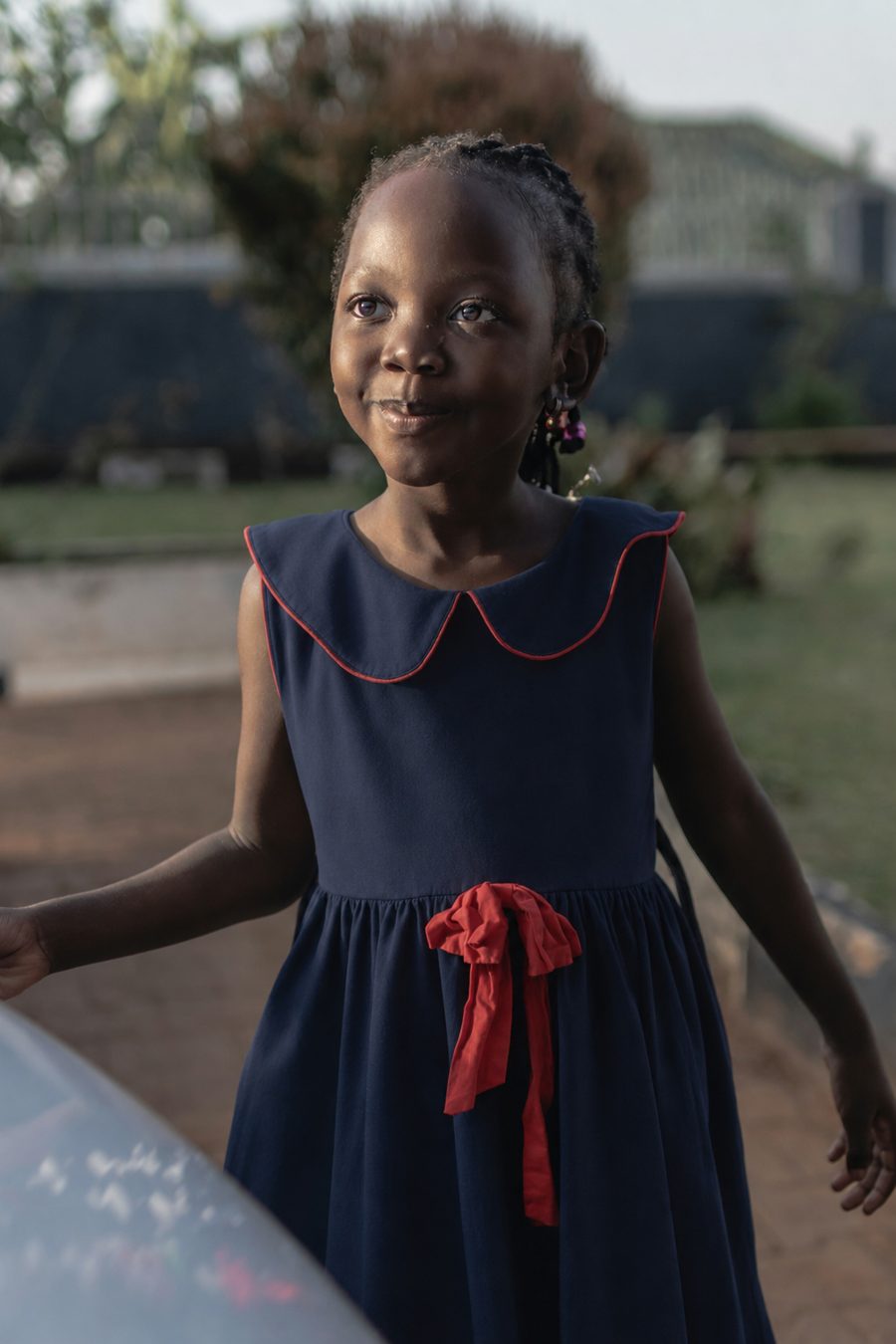 A young girl smiling