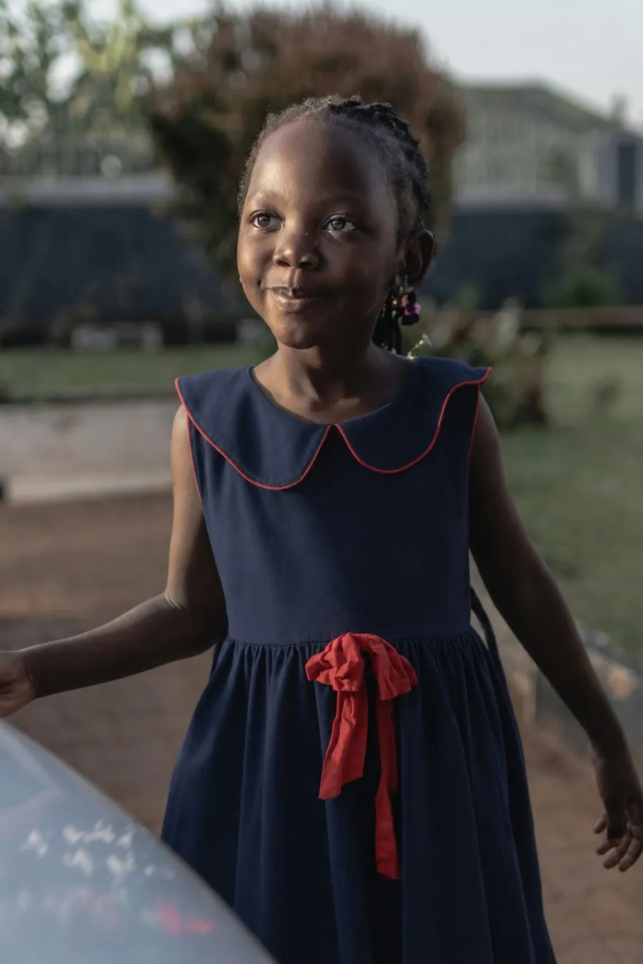 A young girl smiling
