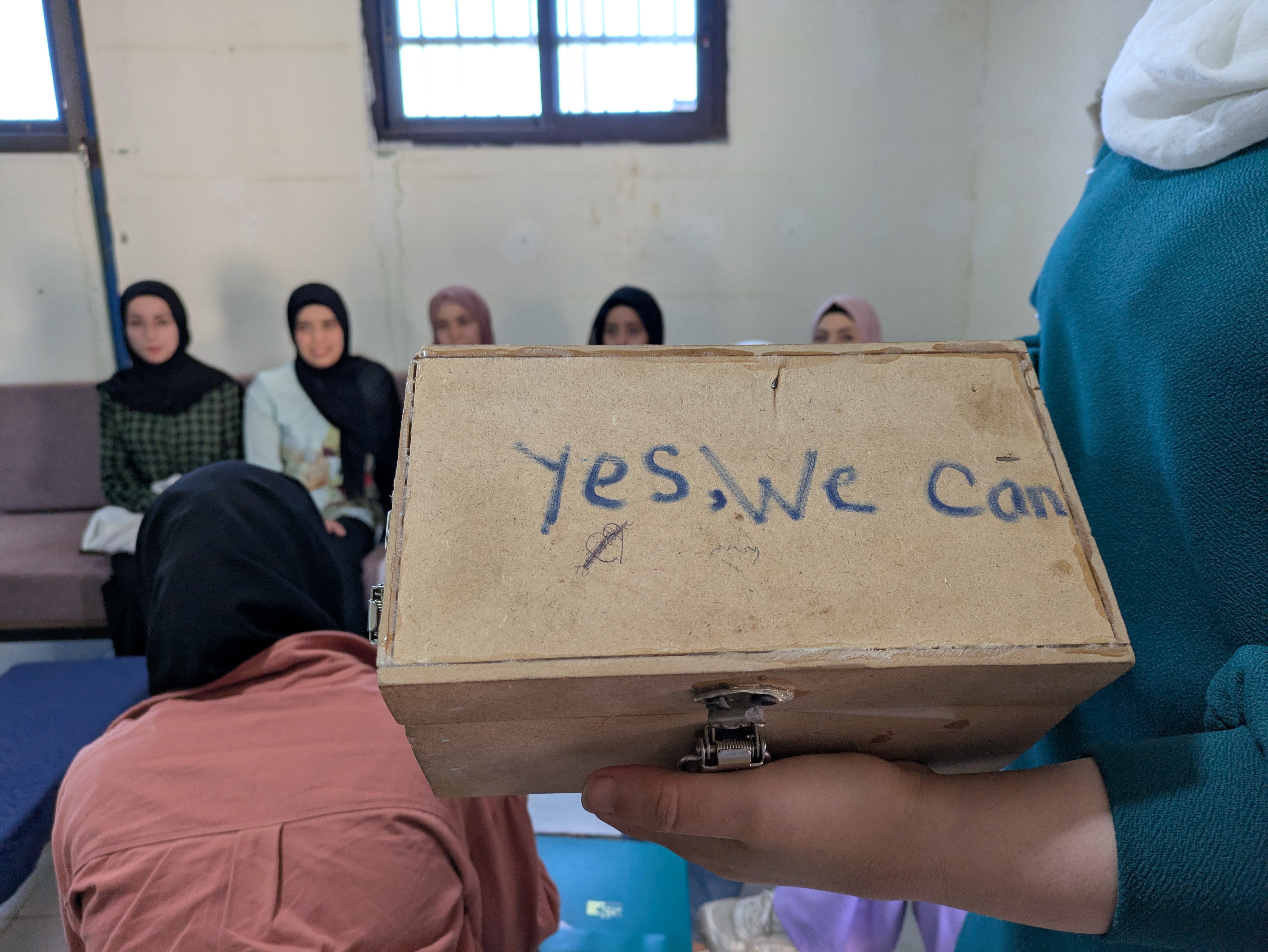 Women with supply box
